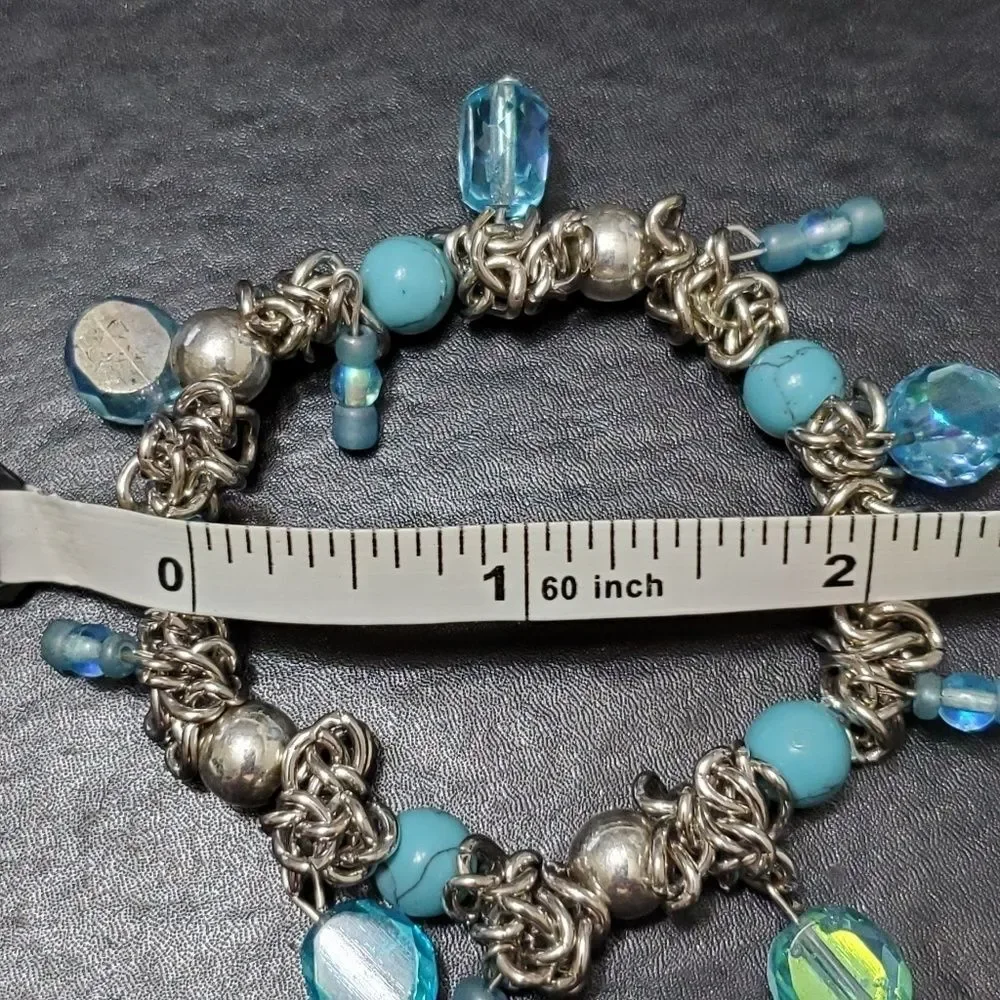 Child's silver tone blue bead bracelet 6